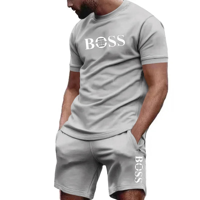 Conjunto de camiseta manga curta e calções de duas peças masculinas .