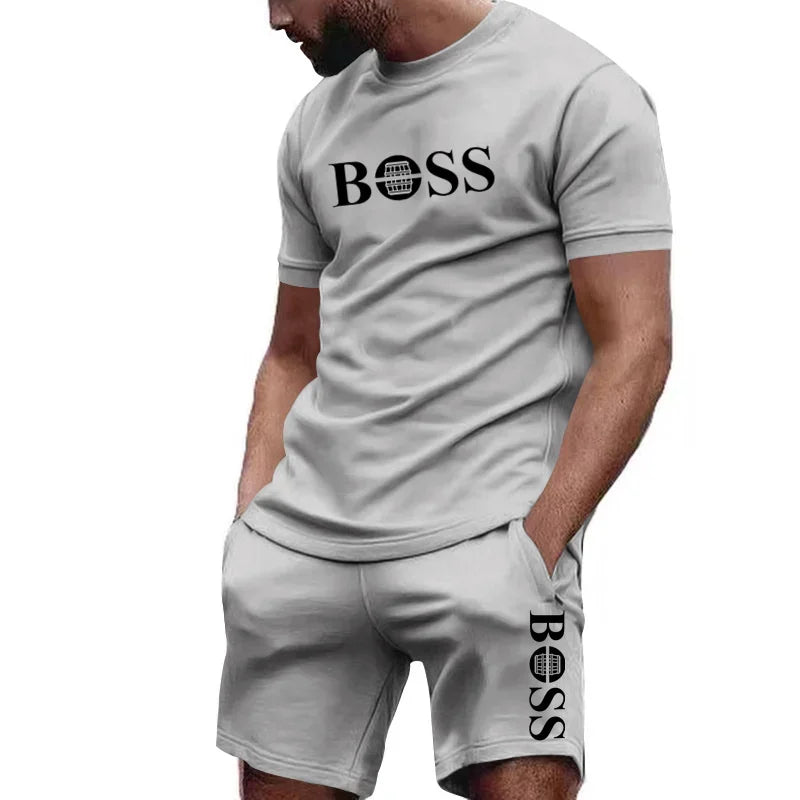 Conjunto de camiseta manga curta e calções de duas peças masculinas .